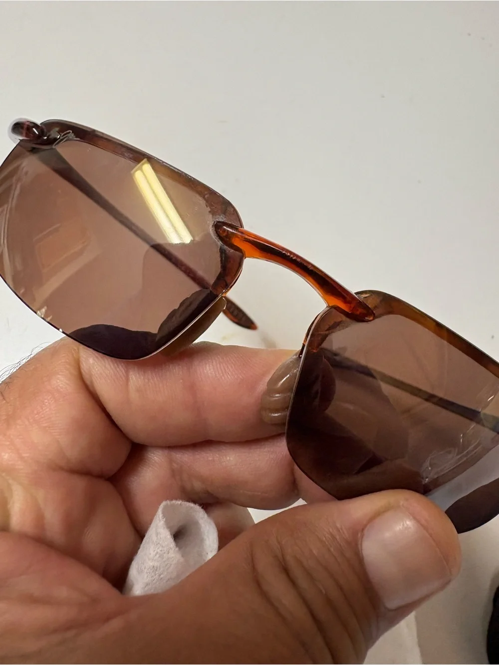 Please see the pictures one of the lenses little small piece missing,